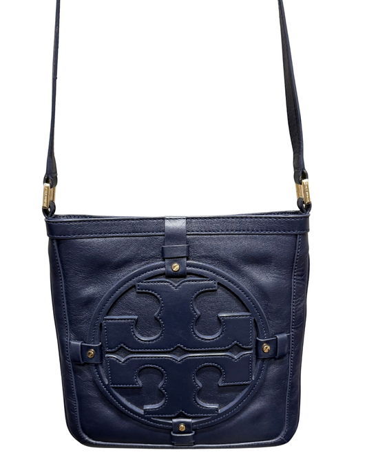 Navy blue handbag with gold accents on a white background