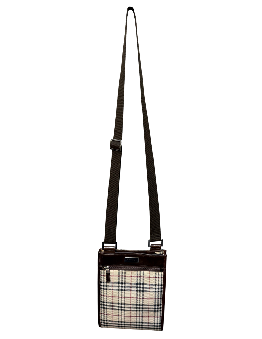 Plaid patterned crossbody bag on a white background