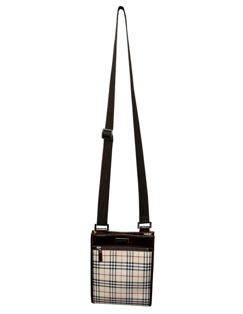 Plaid patterned crossbody bag on a white background