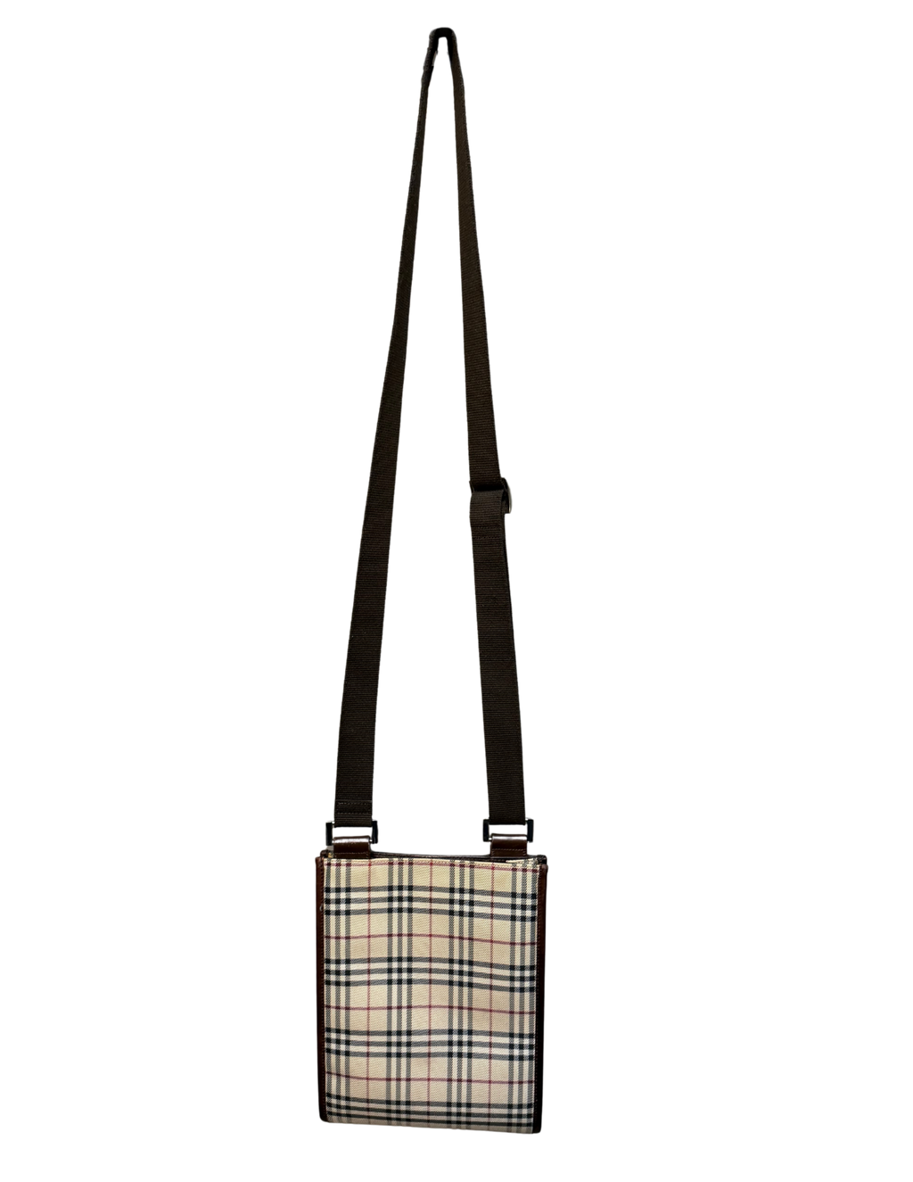 Plaid patterned crossbody bag on a white background