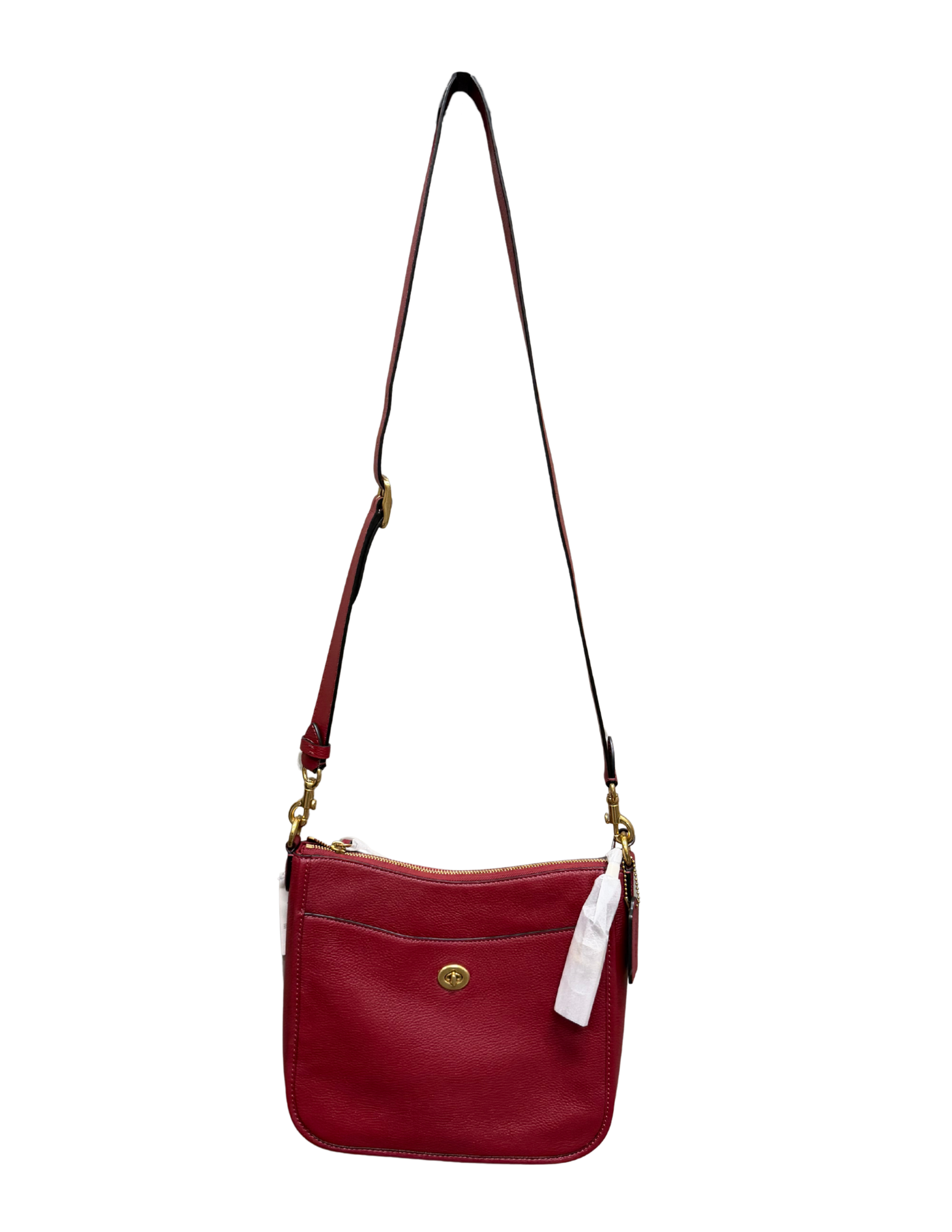 Red handbag with a strap on a white background